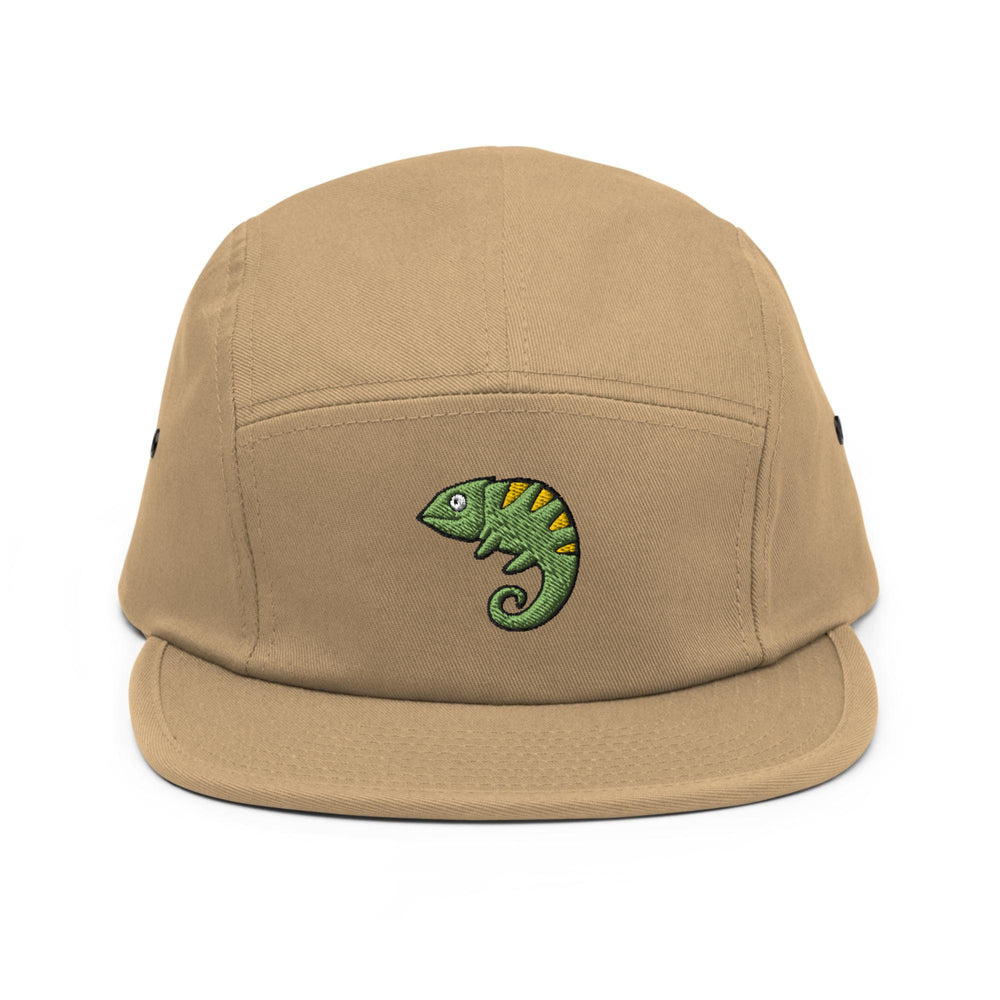 a tan hat with a green chamelon embroidered on it