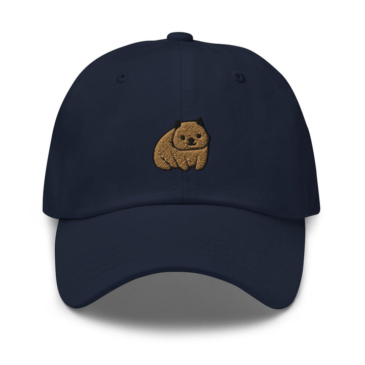 a blue hat with a brown bear embroidered on it