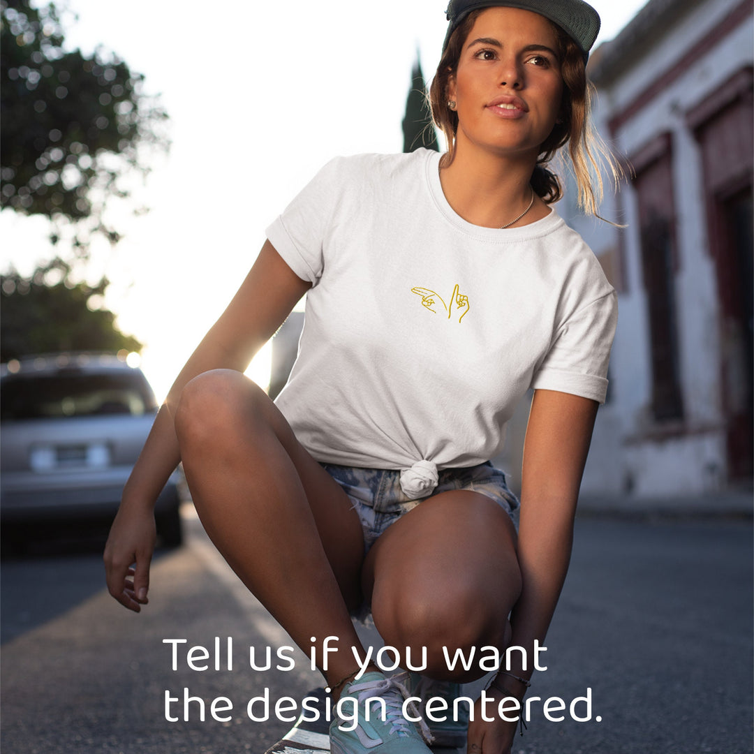 a woman sitting on top of a skateboard on a street