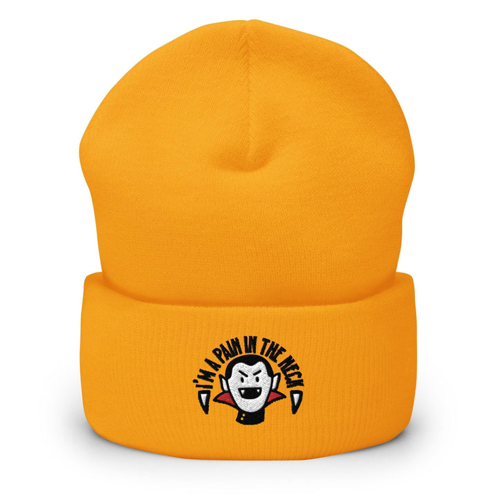 a yellow beanie with a penguin on it