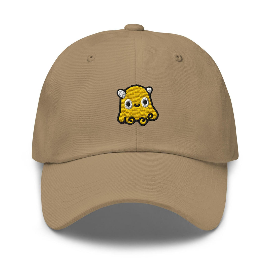 a tan hat with a cartoon character on it