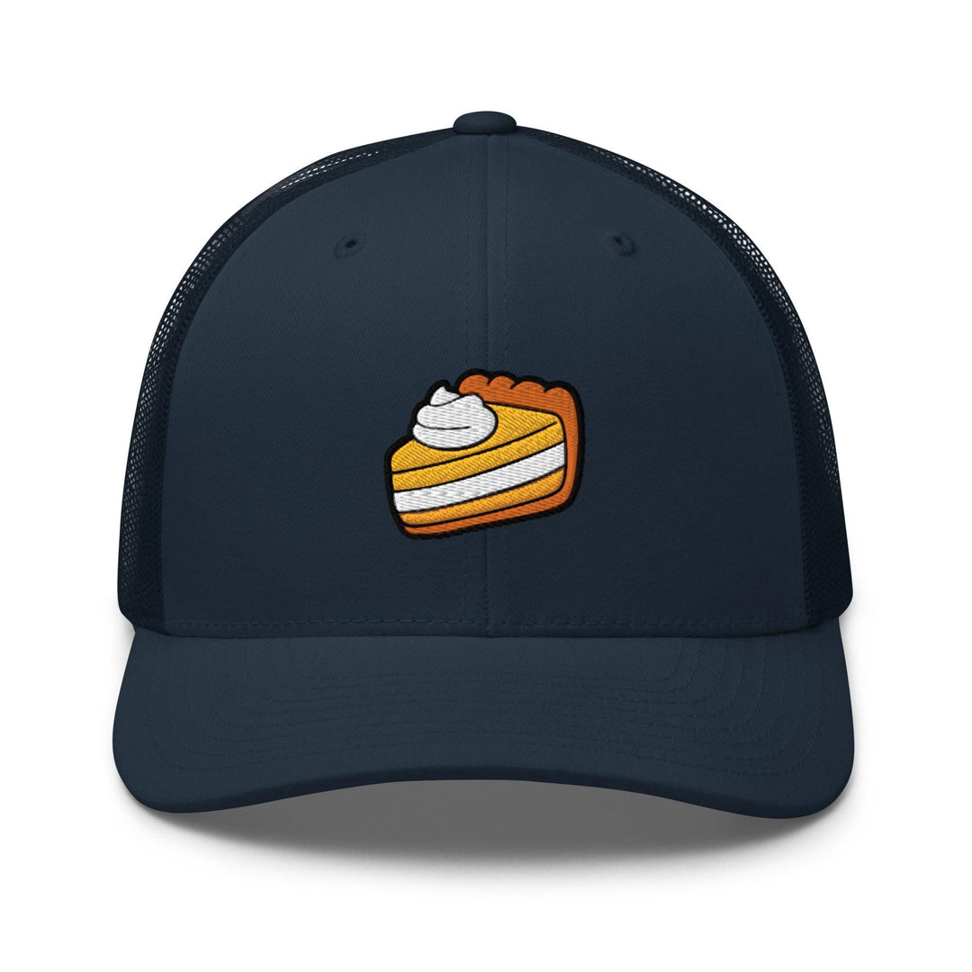 a blue hat with a piece of pie on it