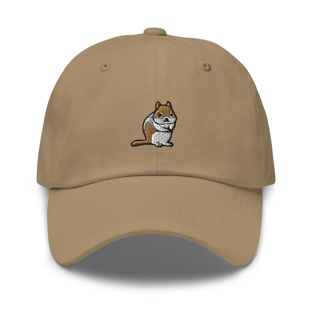 a tan hat with a cat embroidered on it