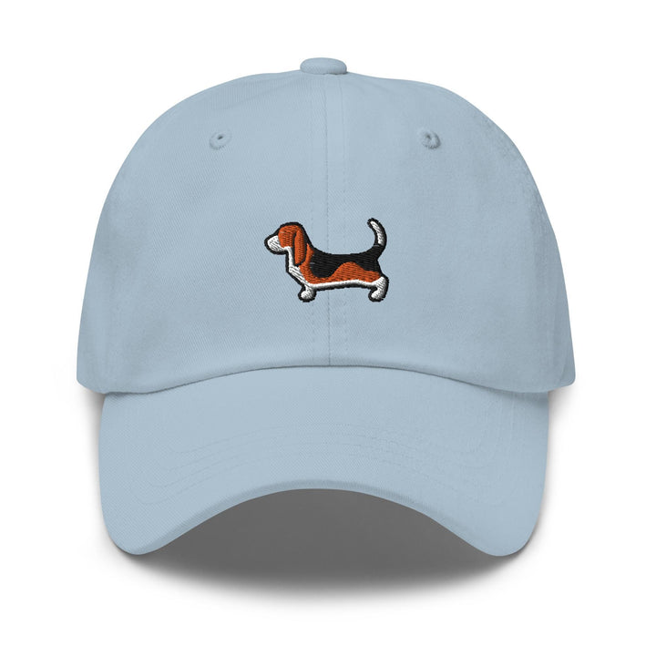 a light blue hat with a dachshund embroidered on the front
