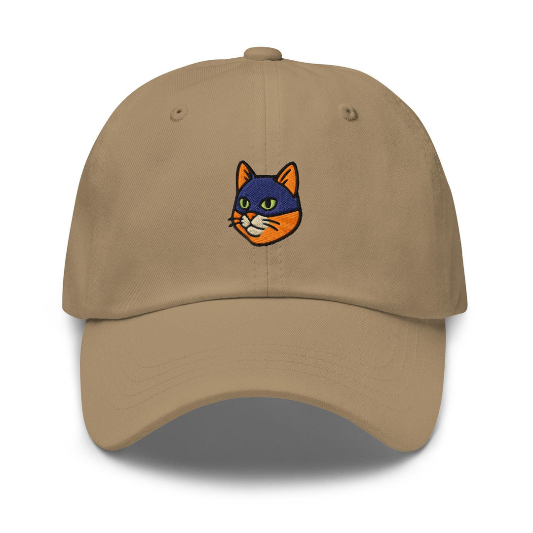 a tan hat with a cat embroidered on the front