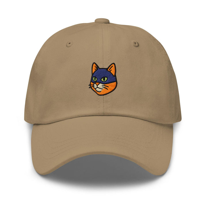 a tan hat with a cat embroidered on the front