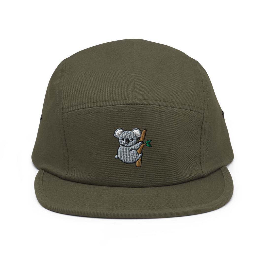 a green hat with a koala bear on it