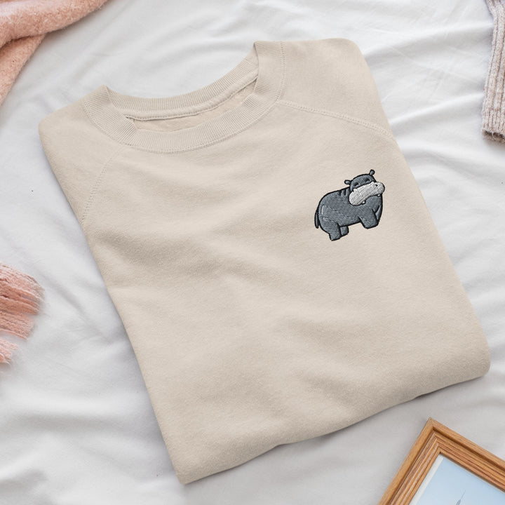 a t - shirt with an elephant embroidered on it