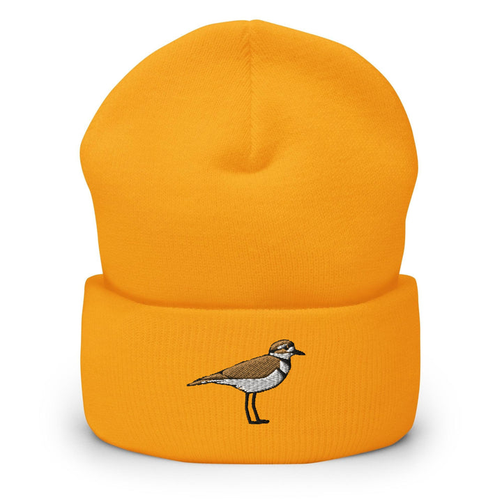a yellow hat with a bird on it
