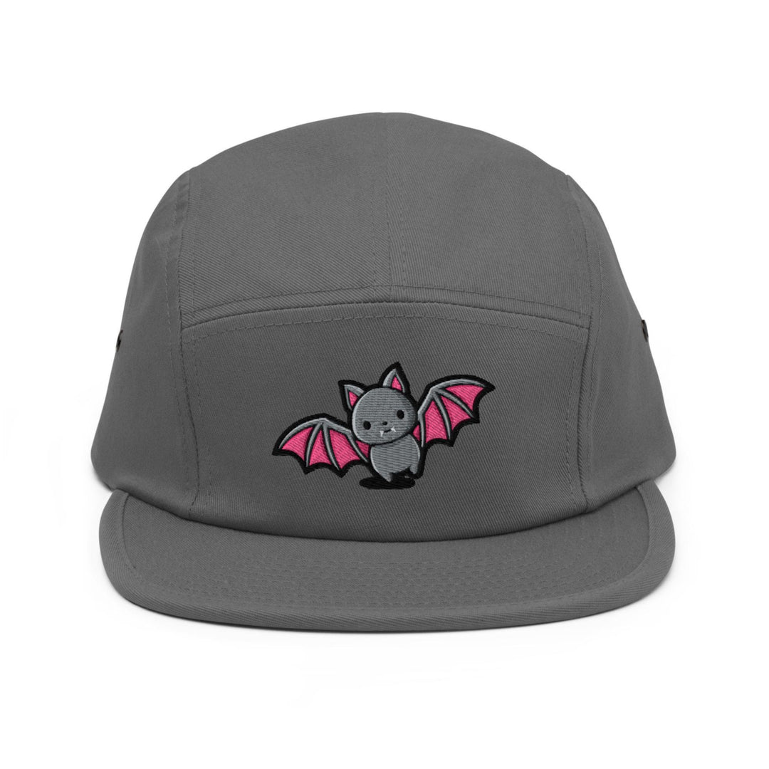 a grey hat with a pink bat embroidered on it