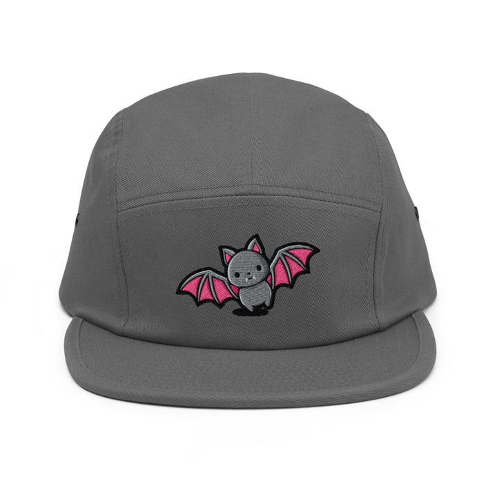 a grey hat with a pink bat embroidered on it