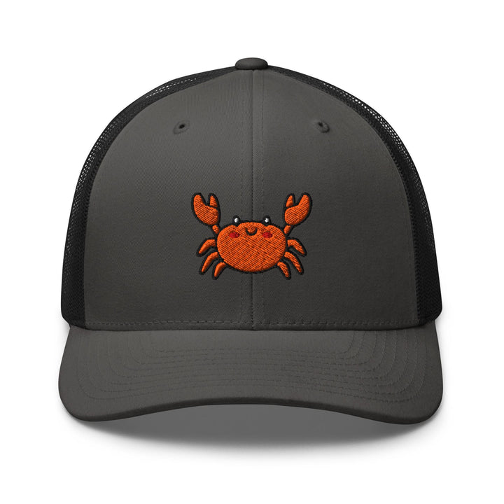 a gray and black trucker hat with an orange crab embroidered on the front