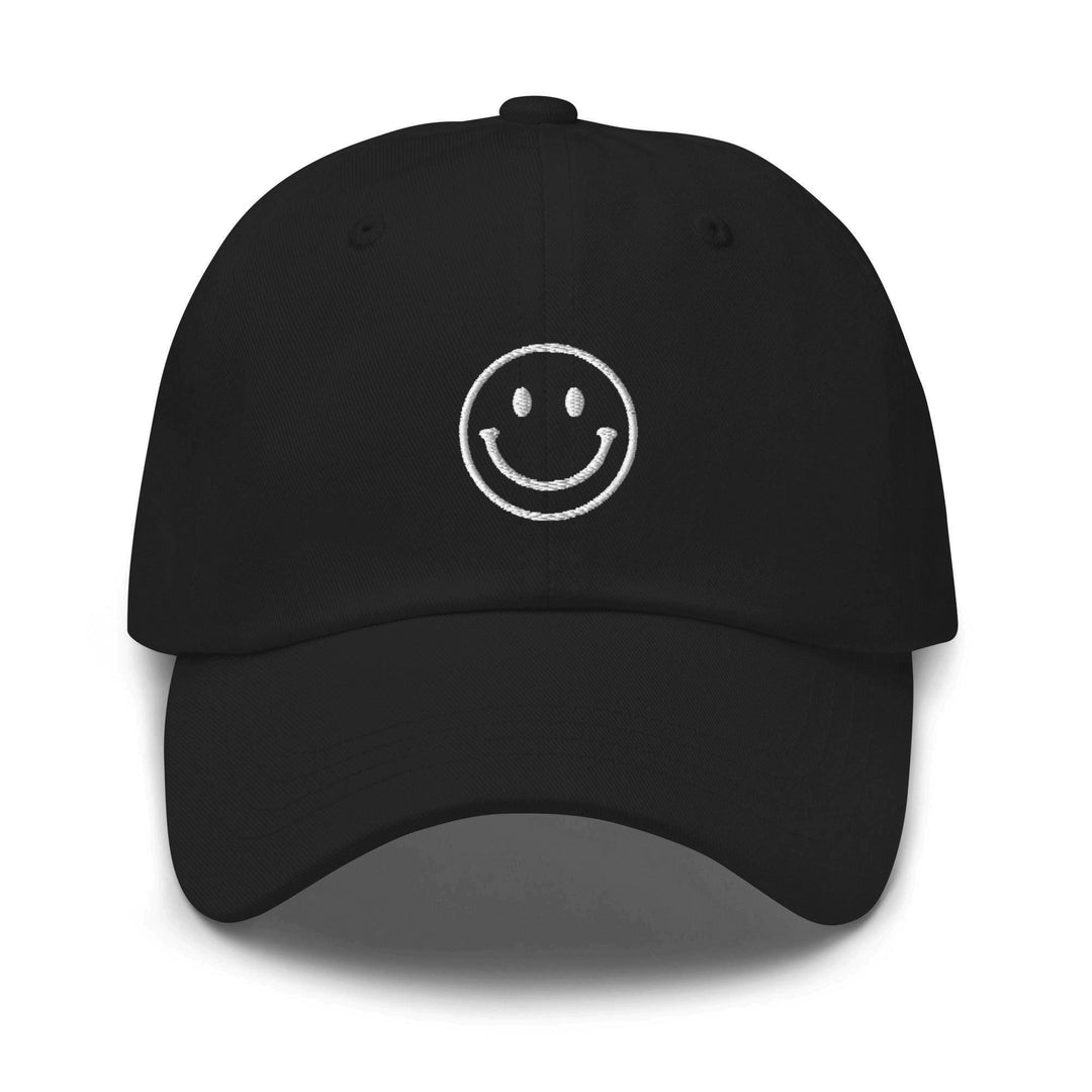 a black hat with a smiley face drawn on it