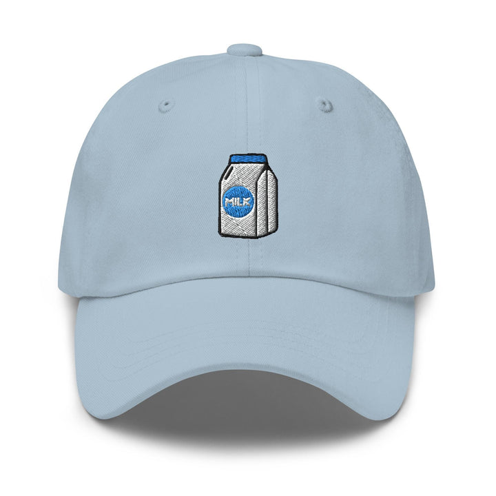 a light blue cap with a picture of a can of milk