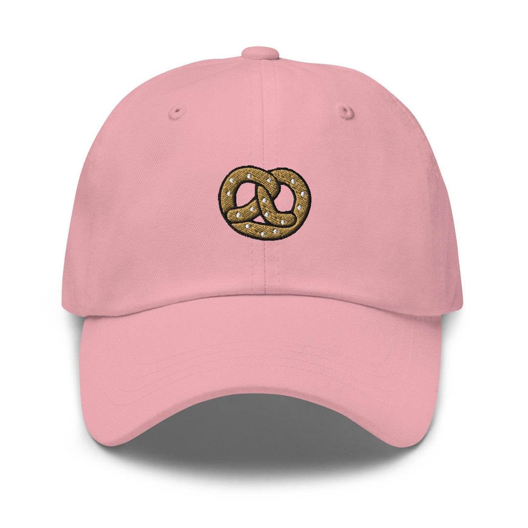 a pink hat with a donut on it
