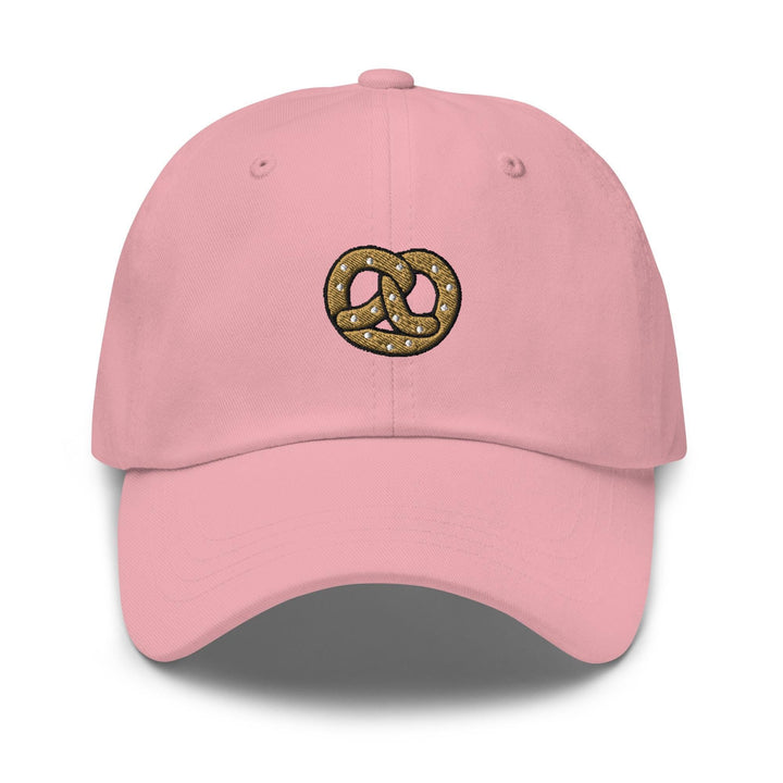a pink hat with a donut on it