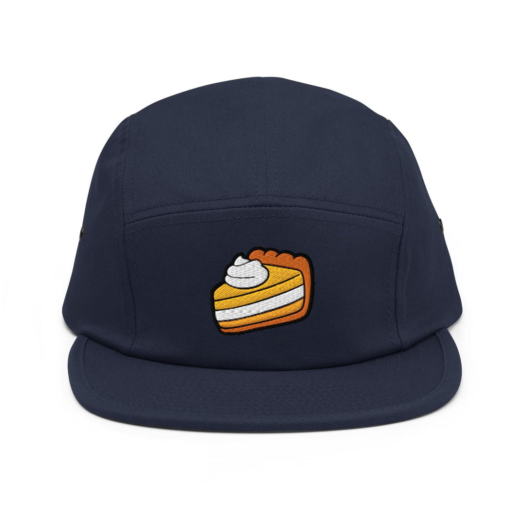 a blue hat with a piece of cake on it
