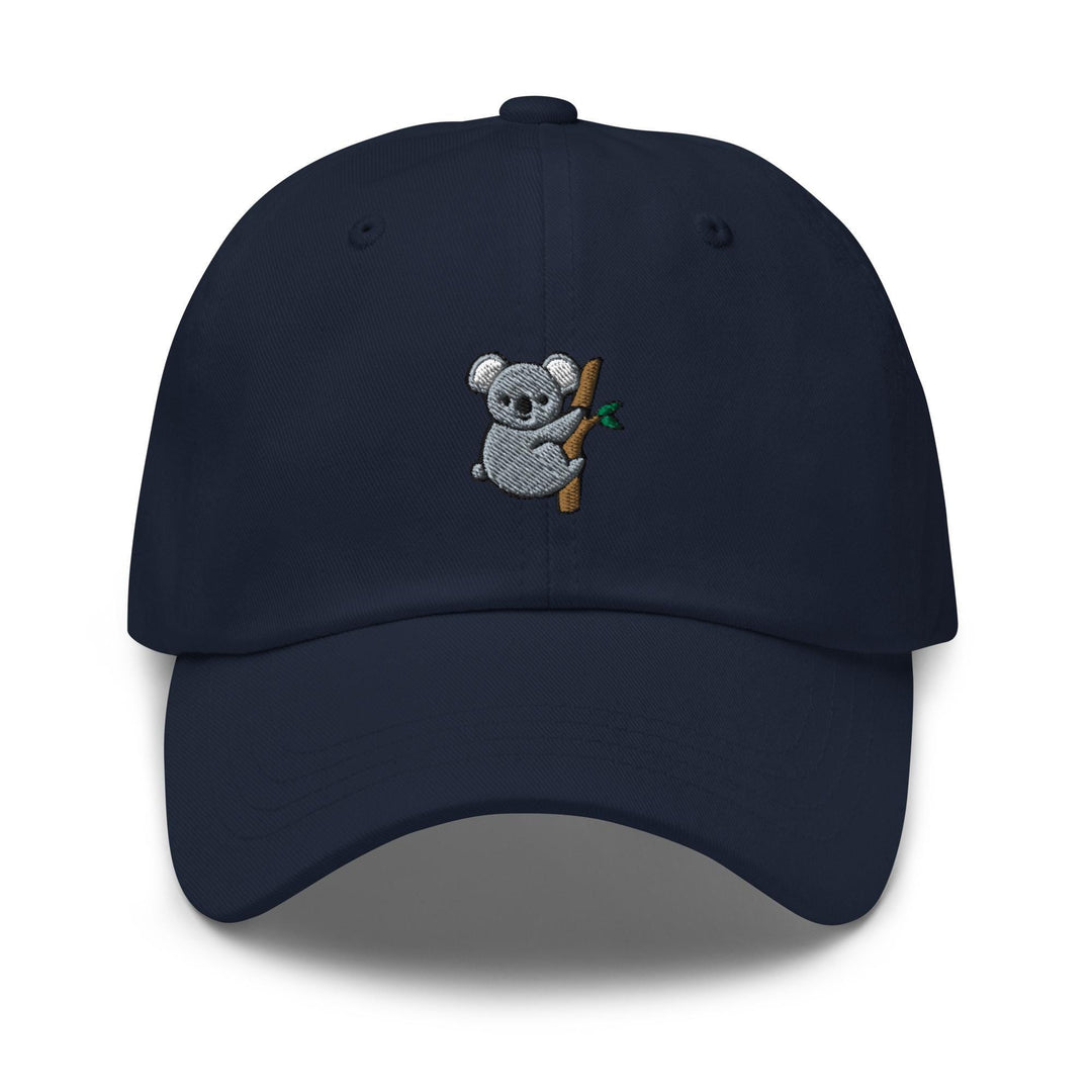 a baseball cap with a koala holding a baseball bat