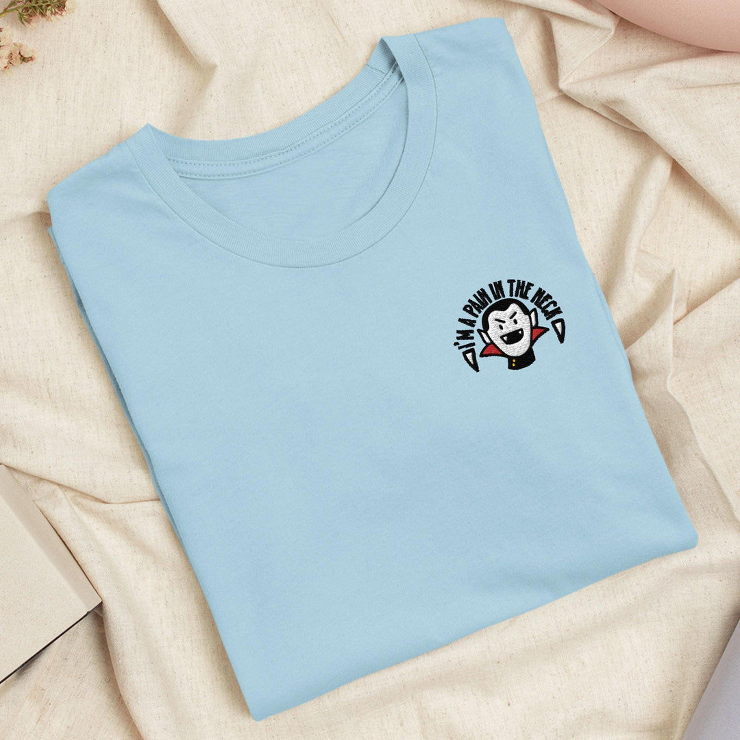 a blue t - shirt with a cartoon character on it