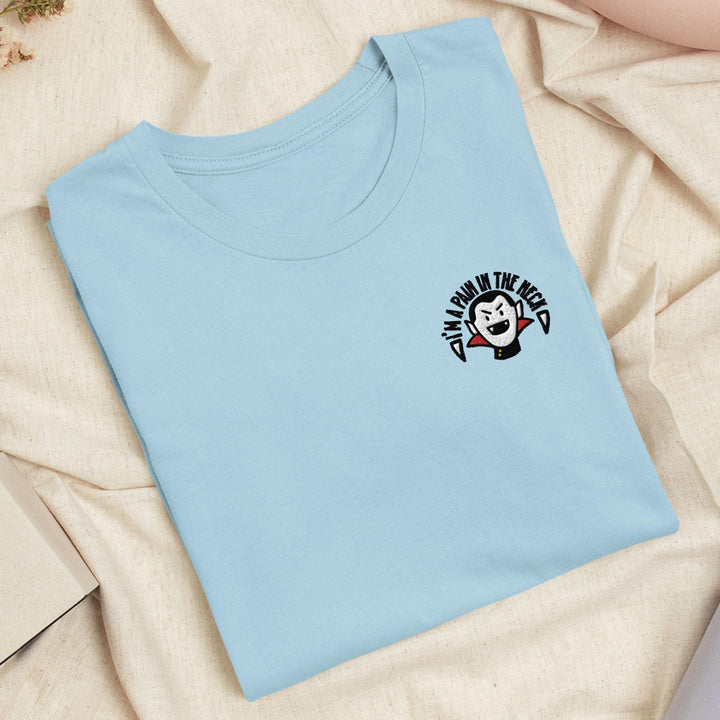 a blue t - shirt with a cartoon character on it
