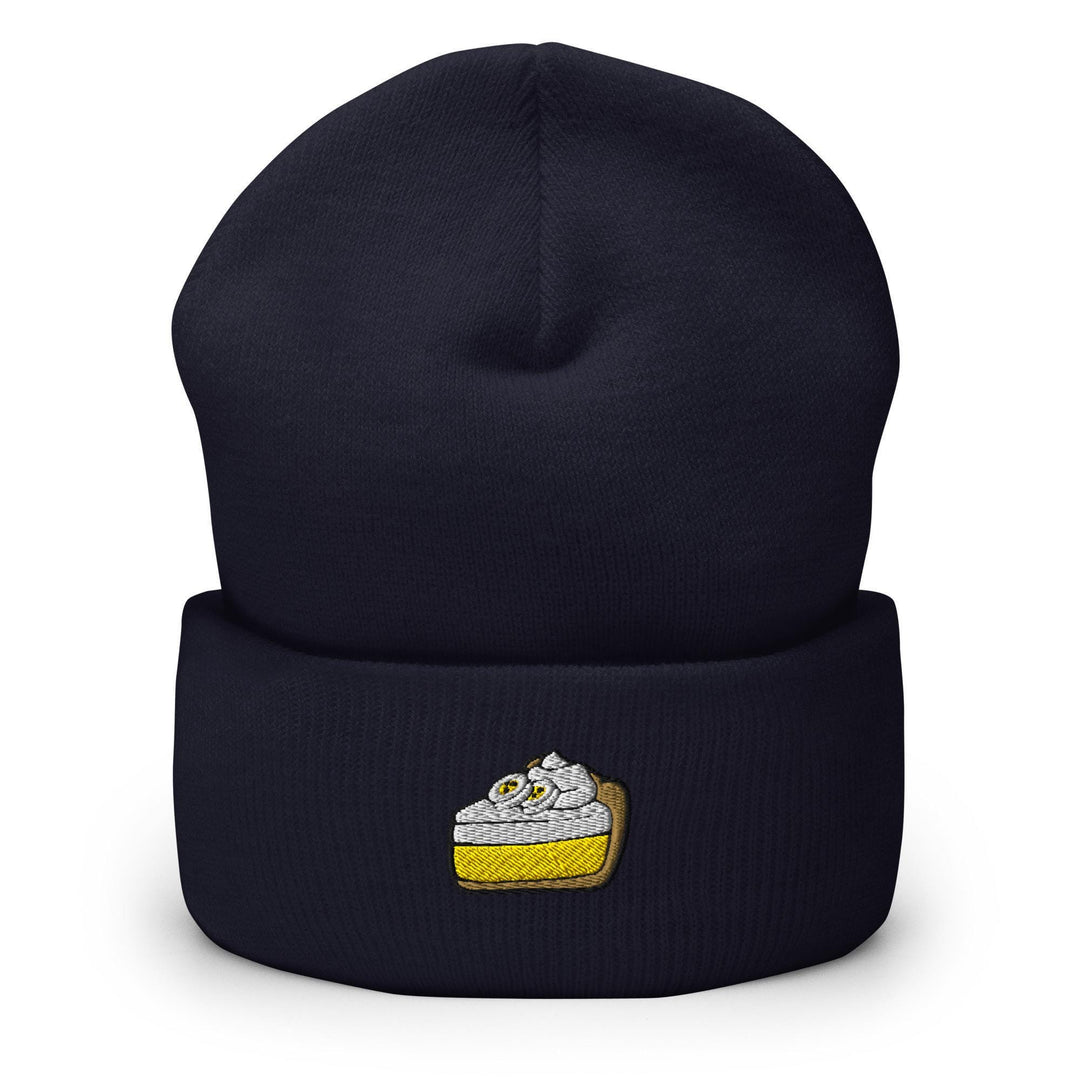 a beanie hat with a piece of cake on it