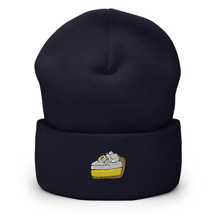a beanie hat with a piece of cake on it
