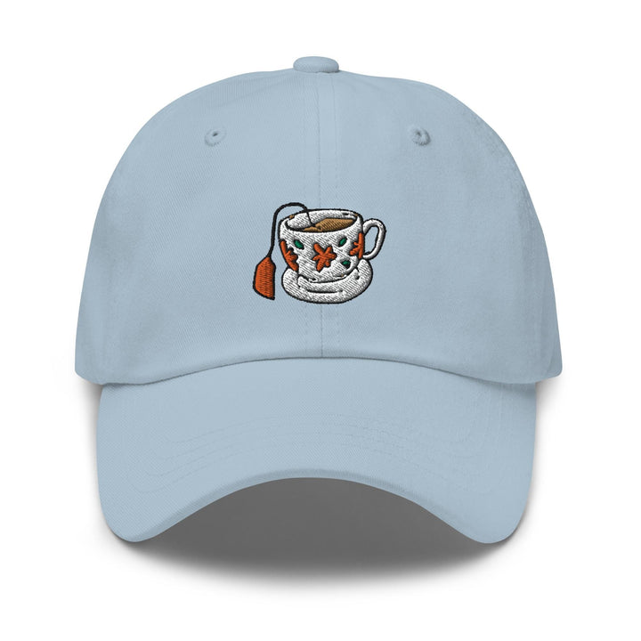 a light blue hat with a coffee cup on it