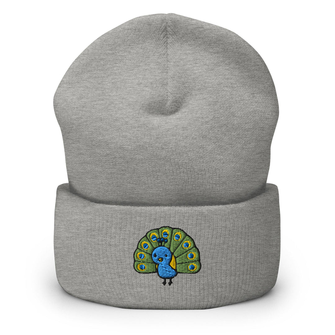 a grey beanie with a blue and green peacock on it