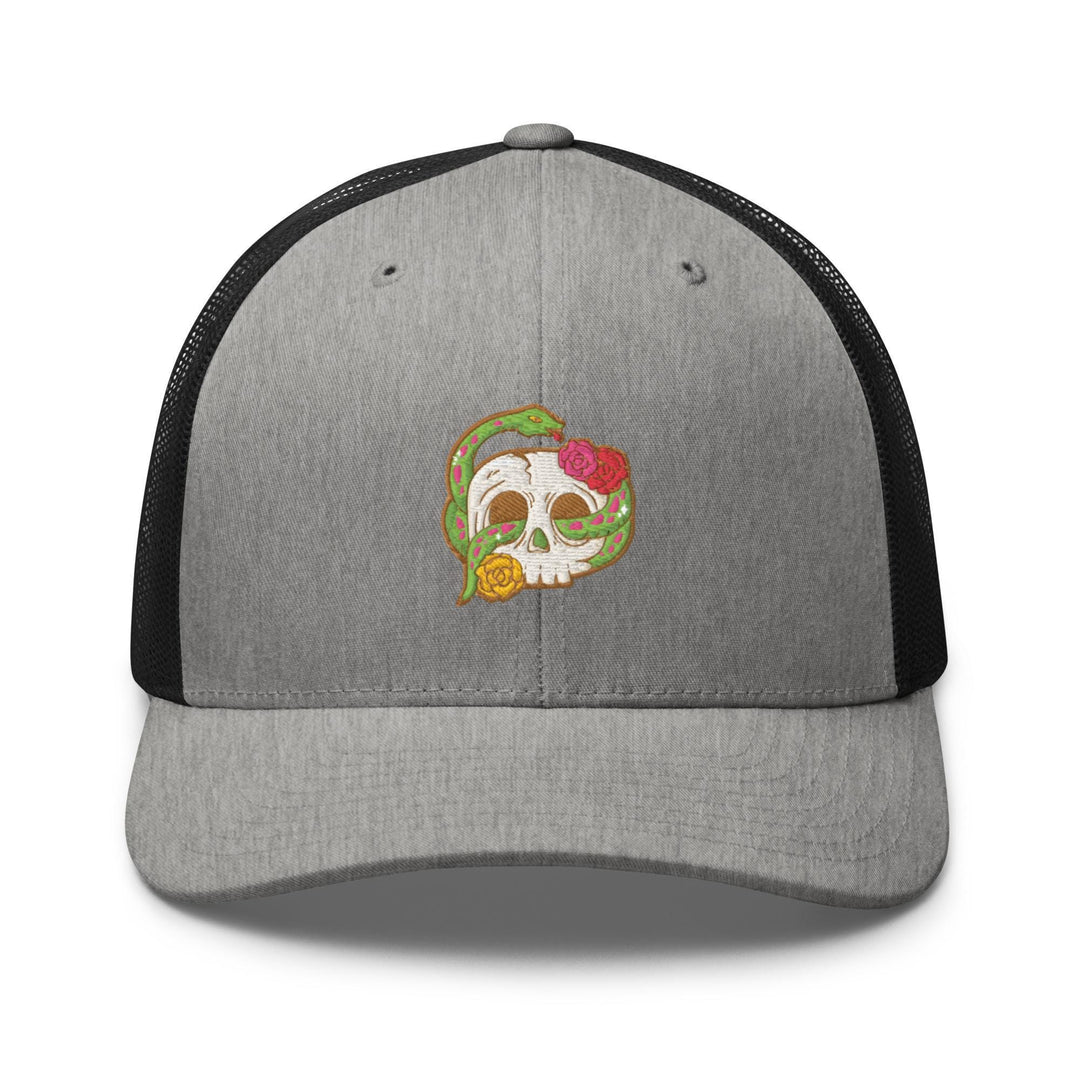 a gray and black trucker hat with a skull on it