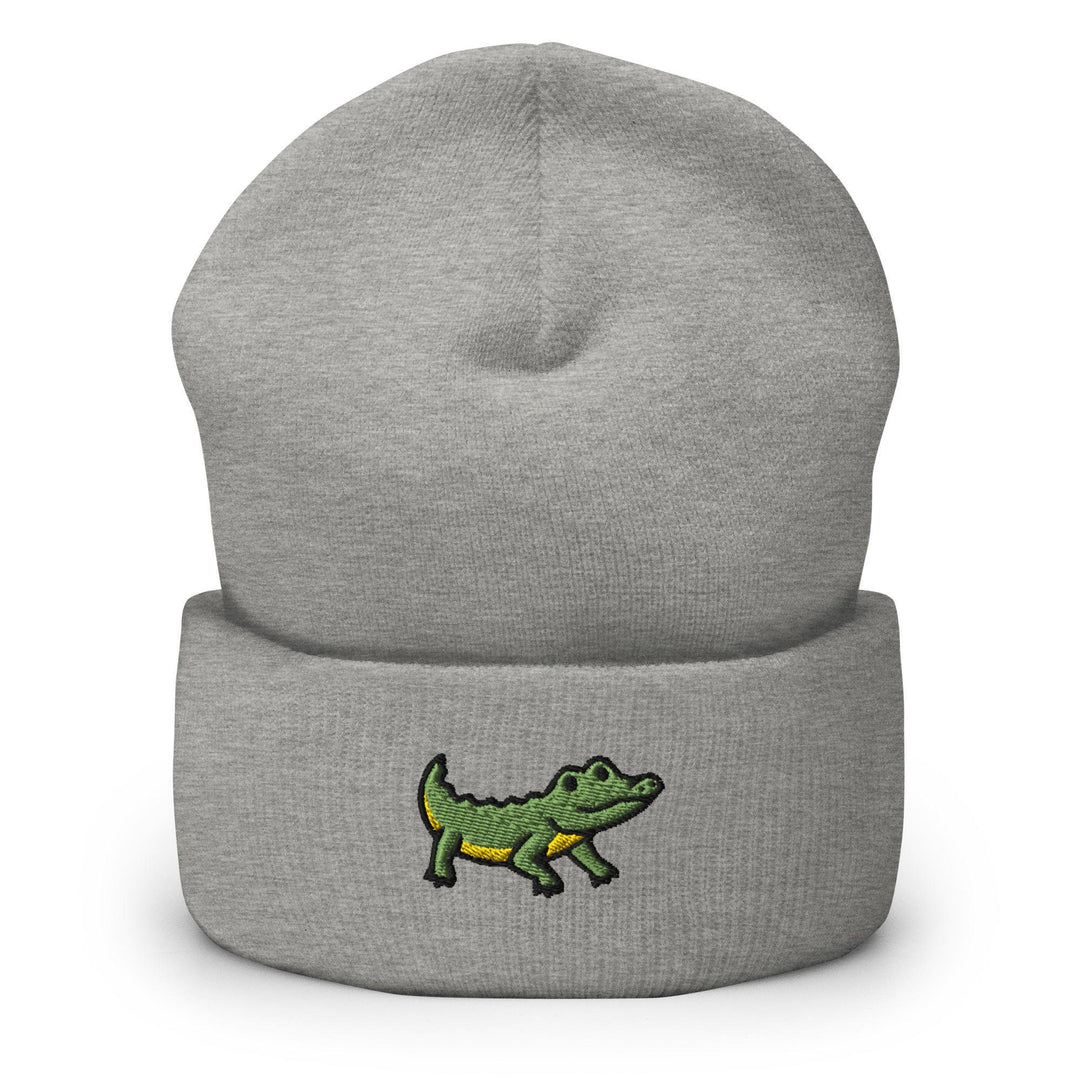a grey beanie with a green alligator embroidered on it