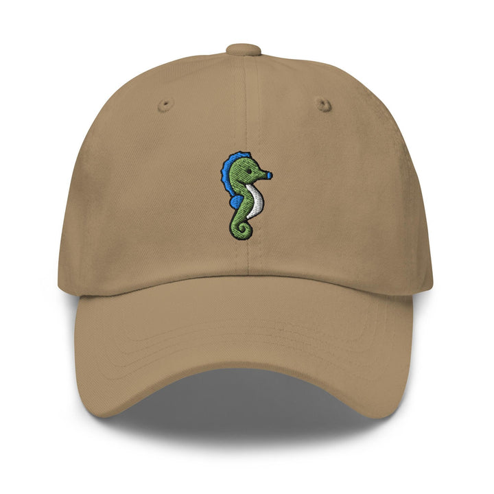 a tan hat with a seahorse embroidered on it