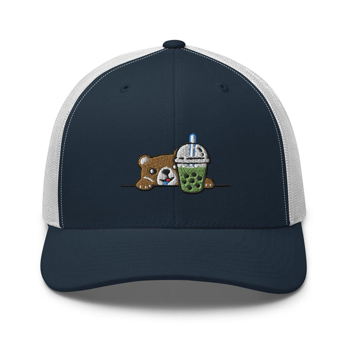 a trucker hat with a teddy bear hugging a cup of coffee