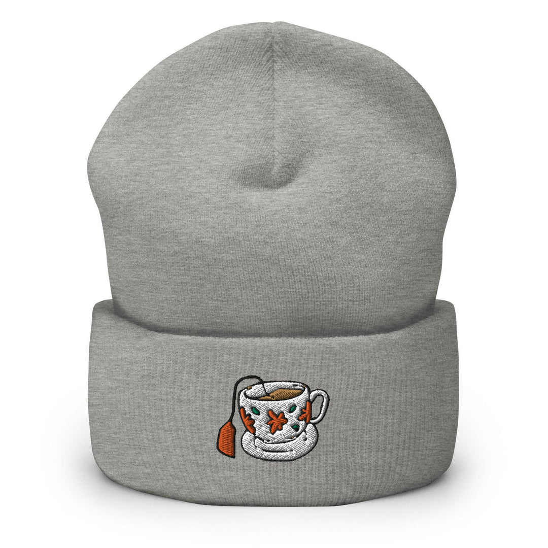 a gray beanie with a coffee cup on it