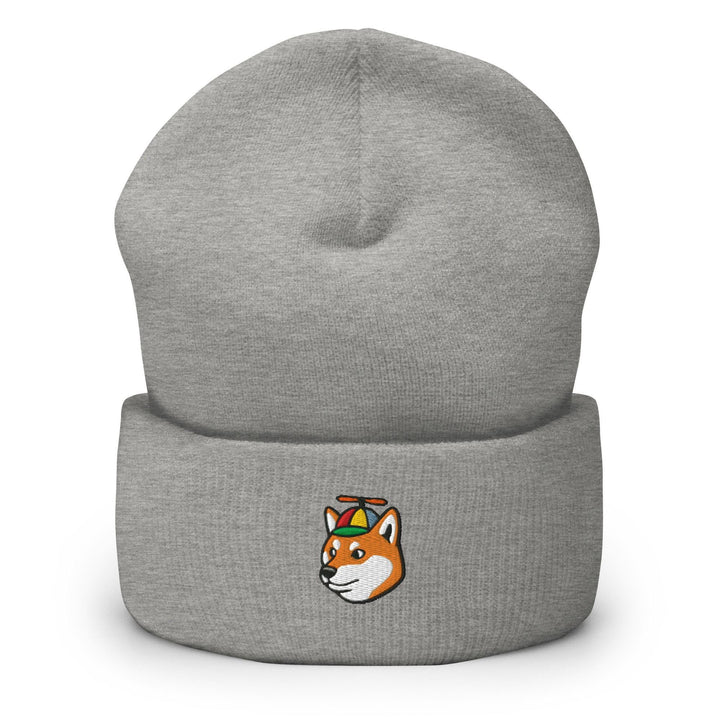a grey beanie with a red fox on it