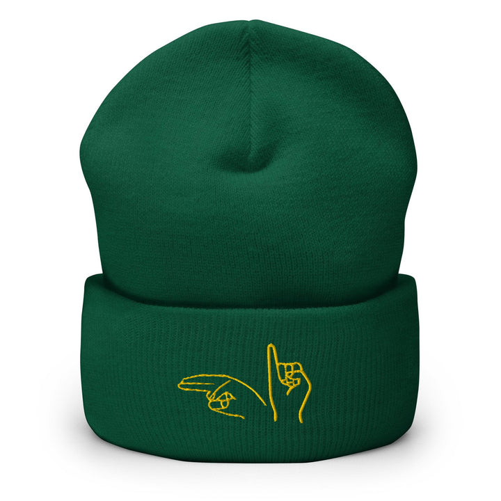 a green beanie with a yellow logo on it