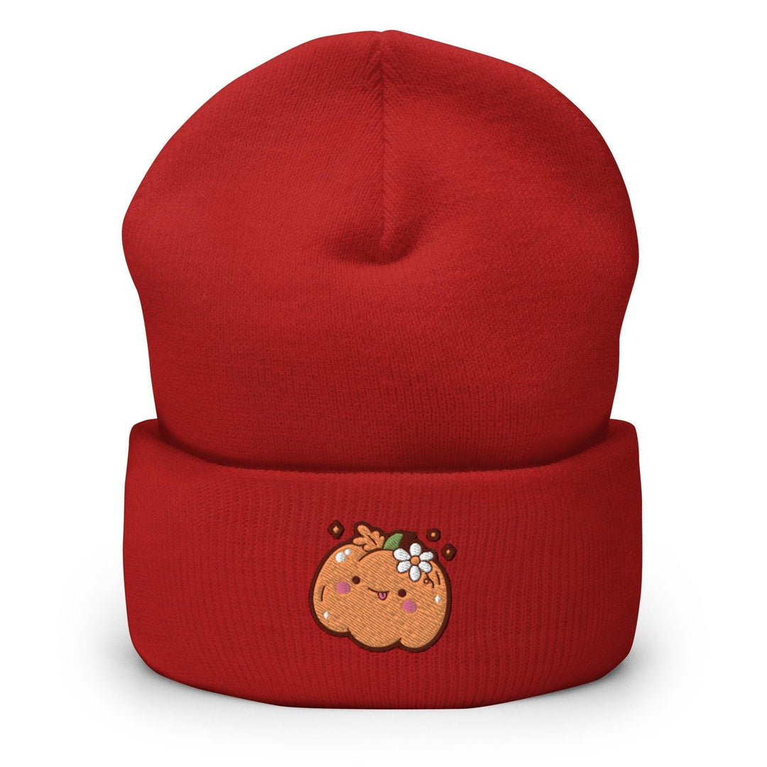a red beanie with a picture of a ginger on it