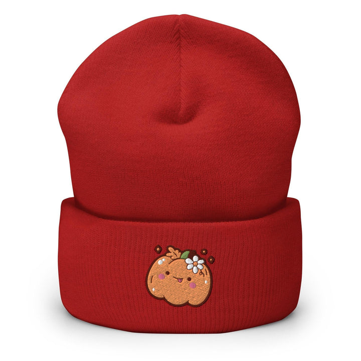 a red beanie with a picture of a ginger on it