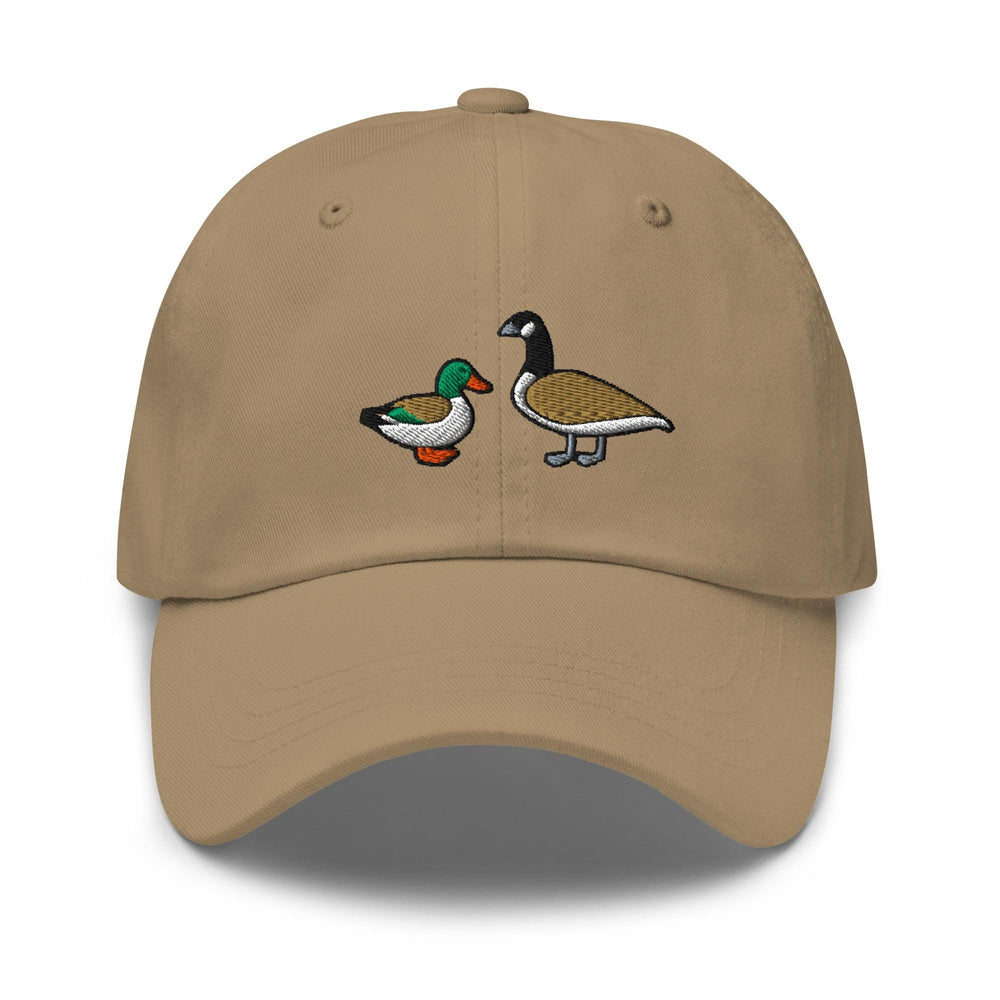 a tan hat with two ducks on it