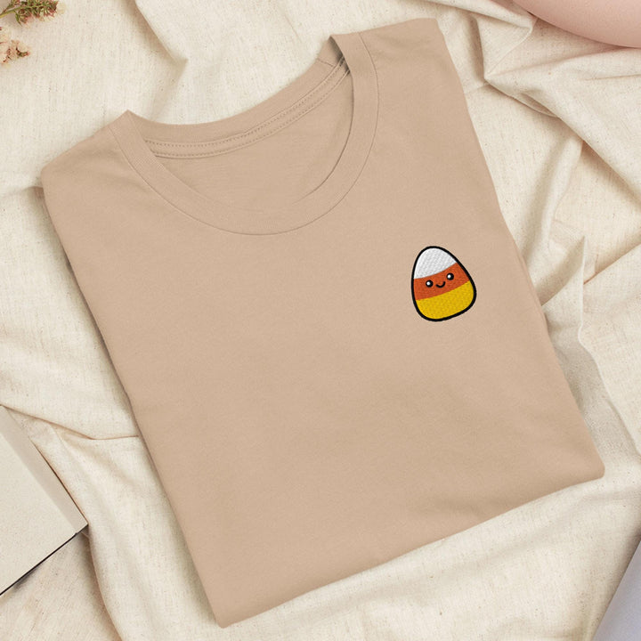 a t - shirt with a candy sticker on it