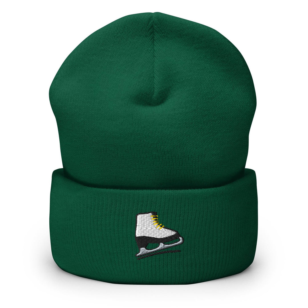a green hat with a pair of ice skates on it