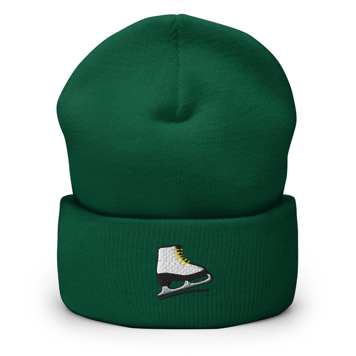 a green hat with a pair of ice skates on it