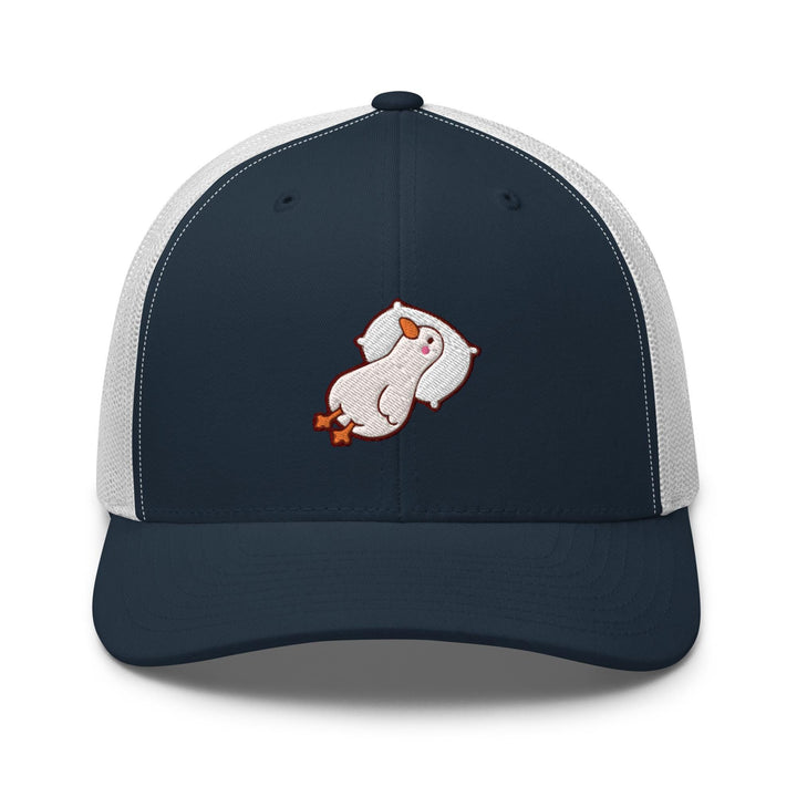 a blue and white trucker hat with a white bear embroidered on the front