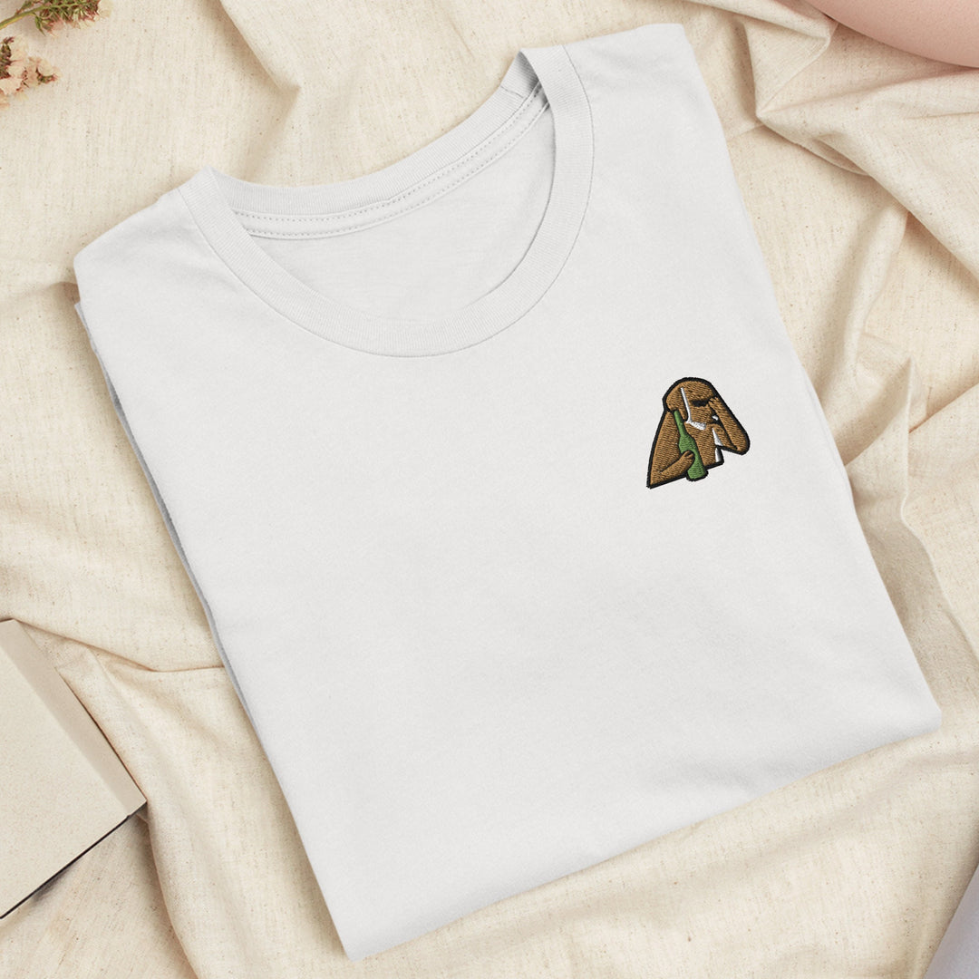 a white t - shirt with a picture of a dog on it