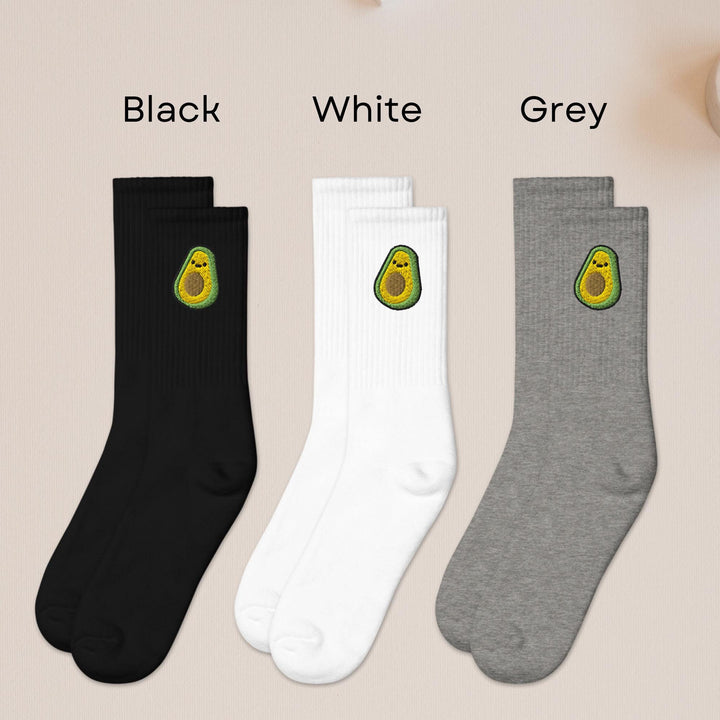 three pairs of socks with avocados on them