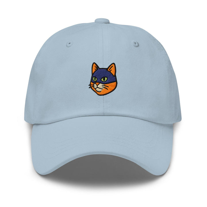 a light blue hat with a cat embroidered on the front