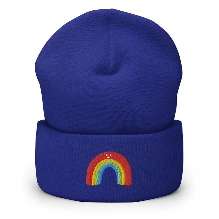 a blue beanie with a rainbow on it
