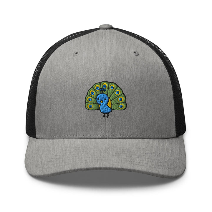 a gray and black trucker hat with a blue peacock on it