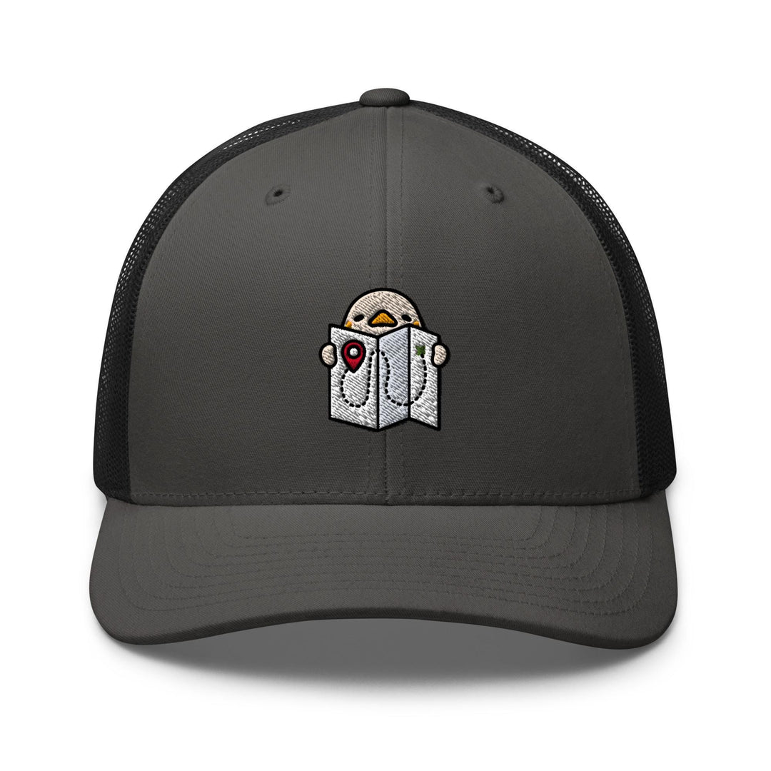 a gray and black trucker hat with a picture of a penguin reading a book