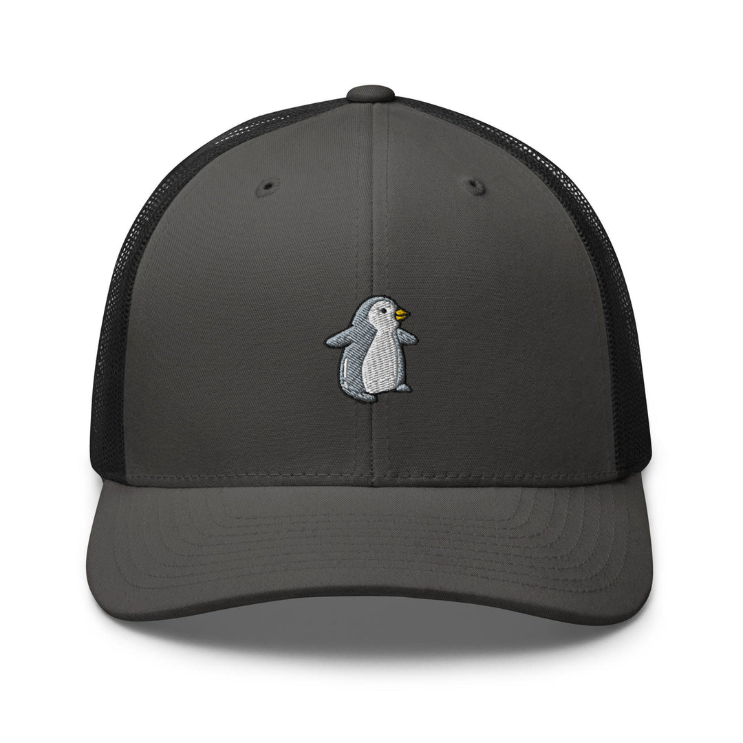 a grey and black trucker hat with a penguin embroidered on the front