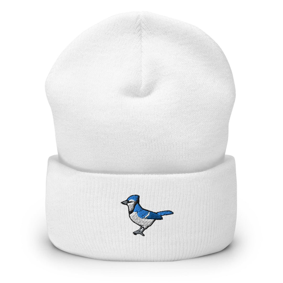 a white beanie with a blue bird on it